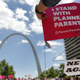 Abortion-rights supporters rally in support of reproductive rights May 30, 2019, in St. Louis. A St. Louis judge issued a restraining order May 31, 2019, prohibiting the state from allowing the license for Missouri’s only abortion clinic to lapse.